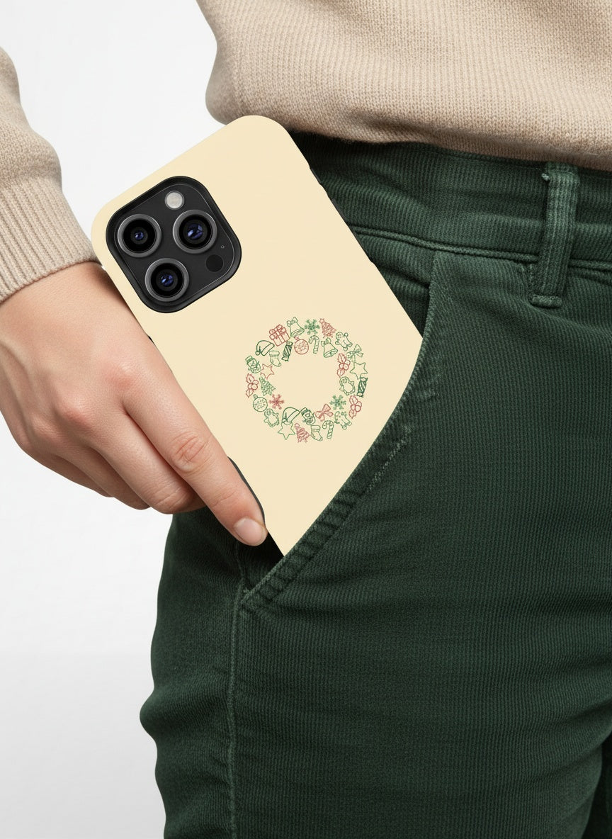 Hand putting phone case into pants pocket Telefono dėklas - Christmas wreath